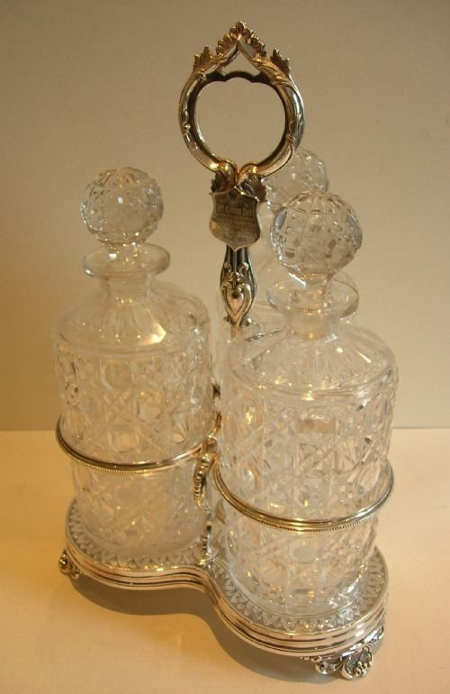 Grand Antique English Decanter Stand / Tantalus with Three Cut Crystal Decanters - Cricket