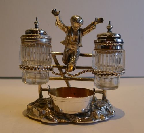 fig 1. Charming Antique Cruet - Registered 1873 - Boy Over Gate In Silver Plate