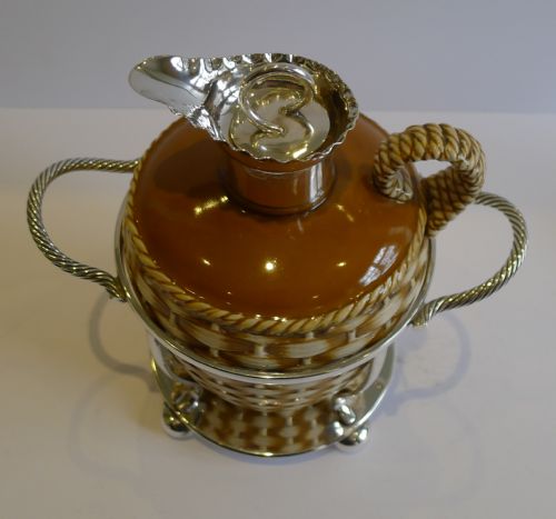 fig 1. Antique English Stoneware Whiskey Decanter by Taylor, Tunnicliffe & Co. in Silver Plated Caddy c.1888