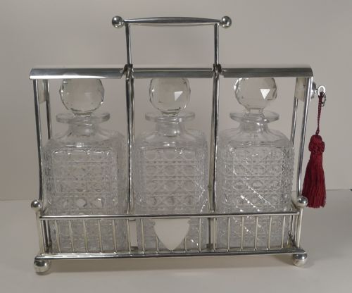 Antique English Three Bottle Tantalus by Atkin Brothers C.1890