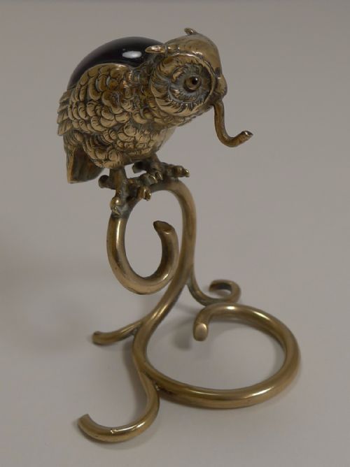 Antique English Brass Figural Pocket Watch Stand - Glass Eyes and Amethyst Coloured Inset