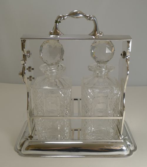 Outstanding Two Bottle Tantalus / Lockable Liquor Frame by John Grinsell & Sons