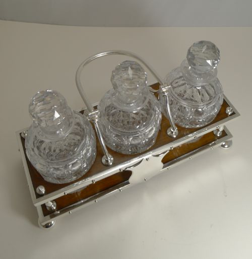 ANTIQUE PARTNER'S OAK AND SILVER PLATE TANTALUS DECANTERS DATED 1885 - ADDITIONAL PHOTO 2