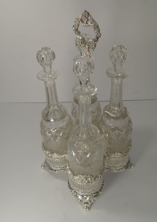 Four Antique English Wine Decanters in Stand C.1890