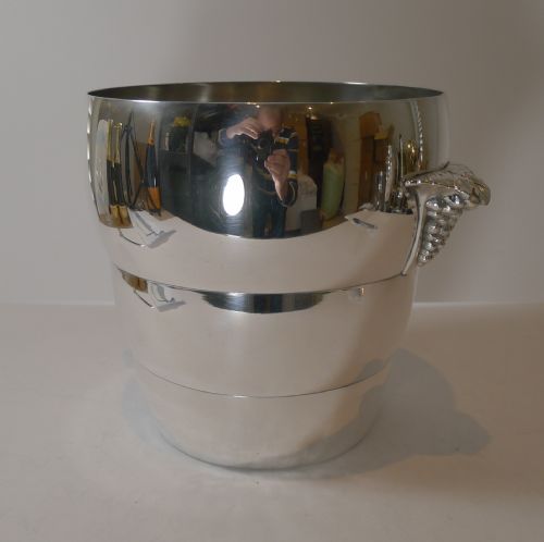 fig 1. A polished silver-plated Art Deco champagne bucket featuring tiered concentric rings and sculpted side handles.