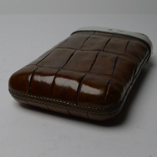 fig 1. A small Victorian crocodile leather cheroot case in warm brown with a hallmarked silver collar.