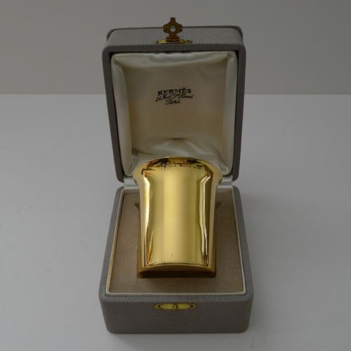 fig 1. A mid-century French sterling silver-gilt beaker by Hermes Paris displayed inside its original fabric-lined grey presentation box.