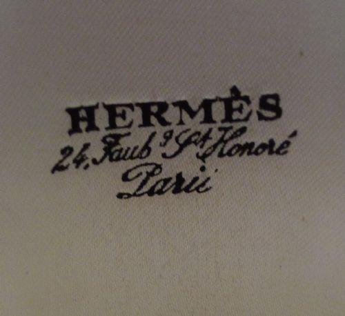 fig 2. A mid-century French sterling silver-gilt beaker by Hermes Paris displayed inside its original fabric-lined grey presentation box.