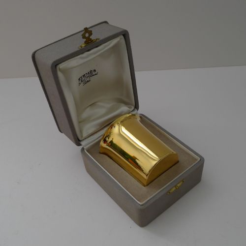 fig 3. A mid-century French sterling silver-gilt beaker by Hermes Paris displayed inside its original fabric-lined grey presentation box.