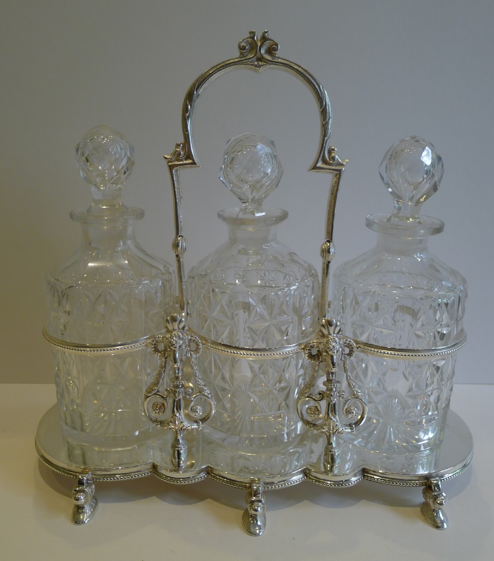 Antique English Figural Tantalus in Silver Plate With Cut Crystal Decanters