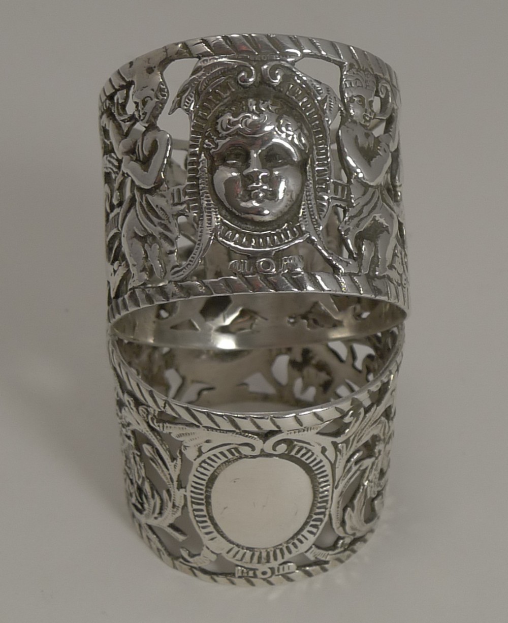 Magnificent Figural Pair Victorian Sterling Silver Napkin Rings by William Comyns