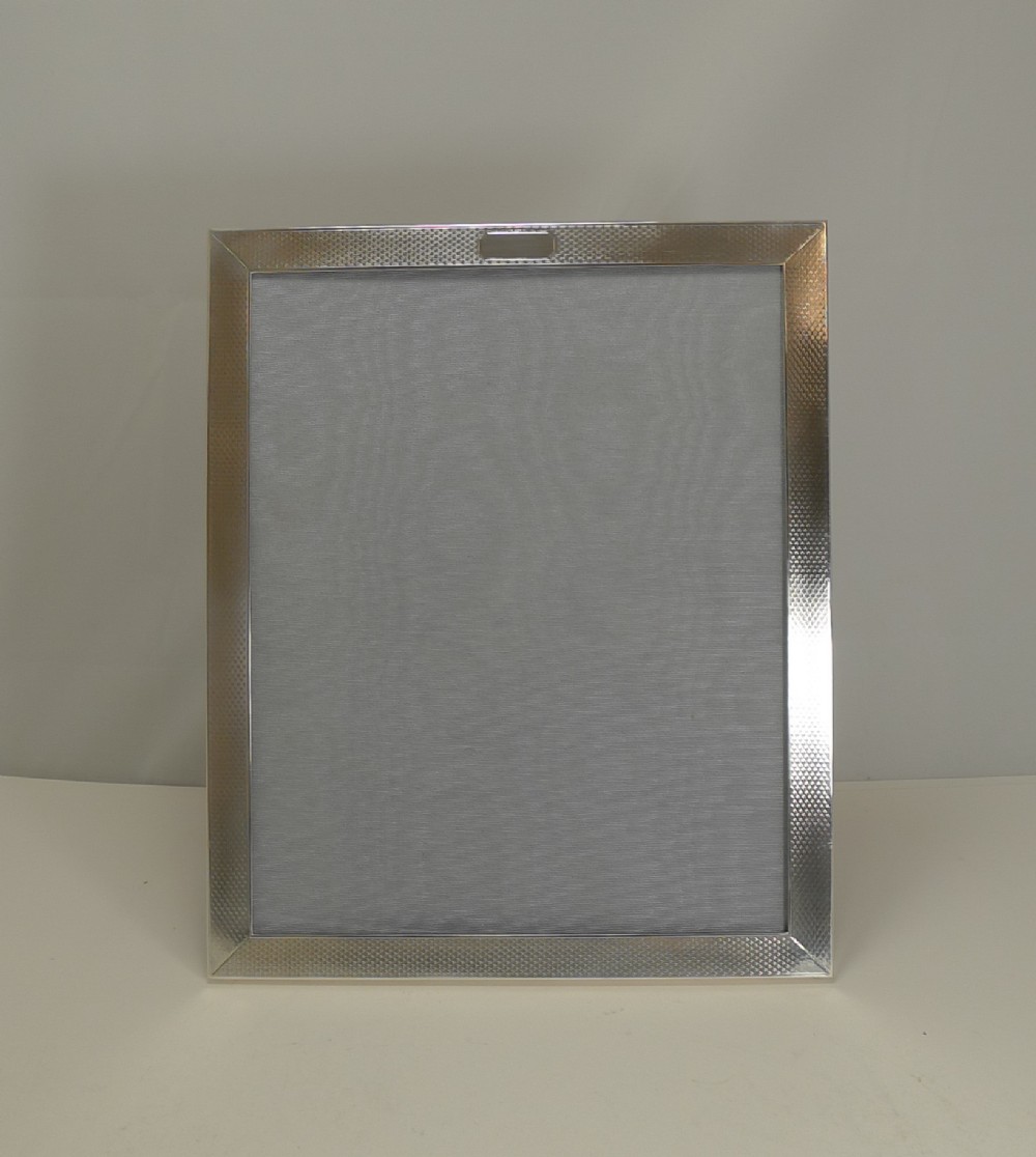 Smart Large Art Deco English Sterling Silver Photograph Frame - 1931 by Elkington & Co.