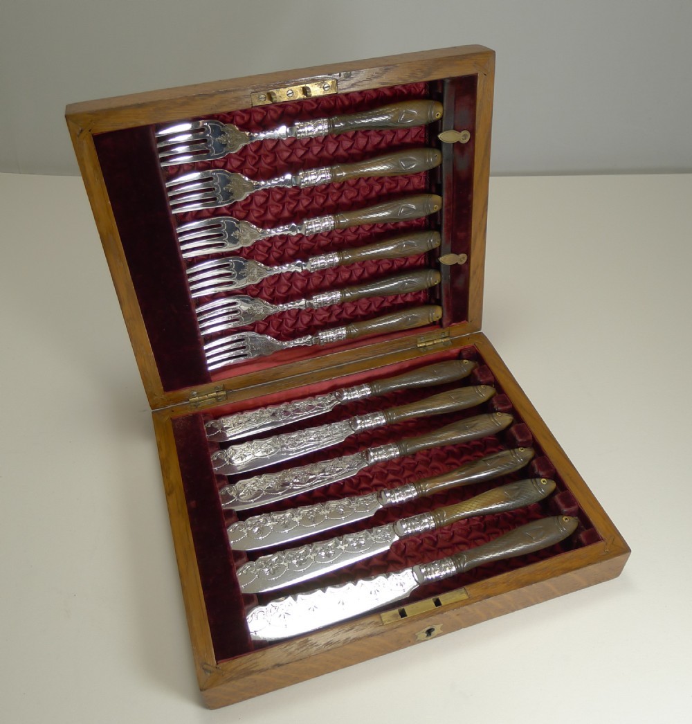 Rare Set Fish Knives and Forks - Figural Carved Handles with Glass Eyes - 1909