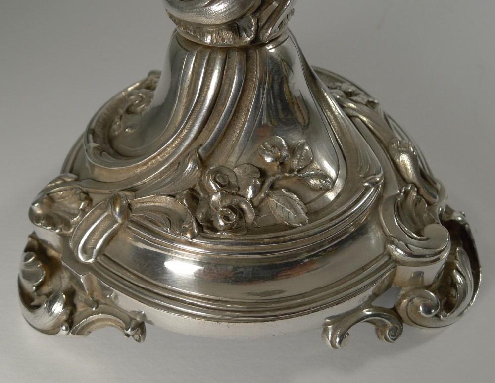 An antique Art Nouveau centrepiece featuring a cut crystal bowl sitting atop a decorated silvered bronze pedestal base. View VIII
