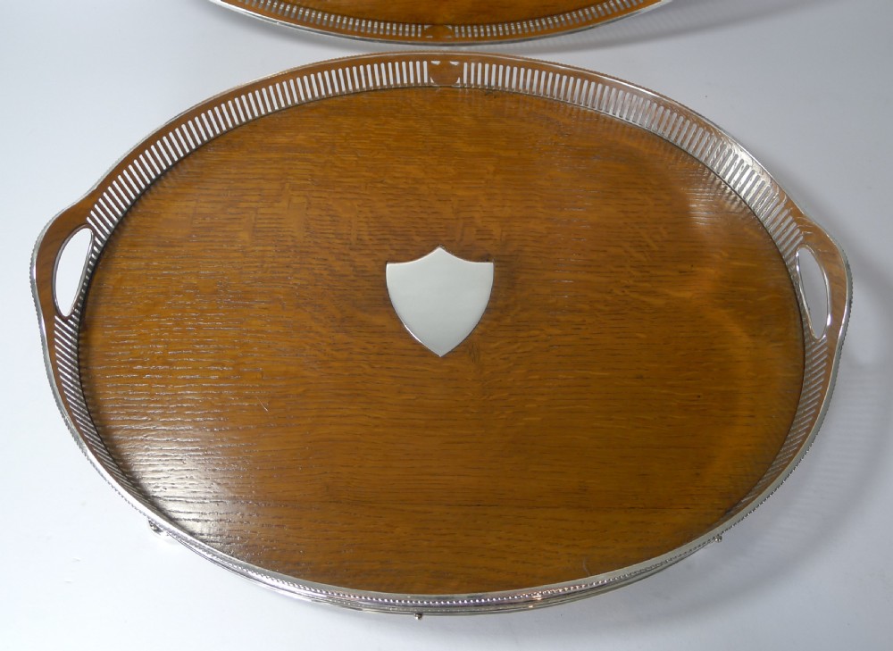 Grand Graduated Pair Late Victorian Oak and Silver Plate Serving Trays View II