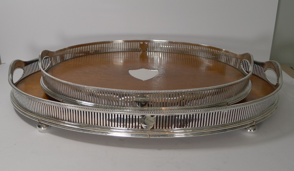 Grand Graduated Pair Late Victorian Oak and Silver Plate Serving Trays View IX