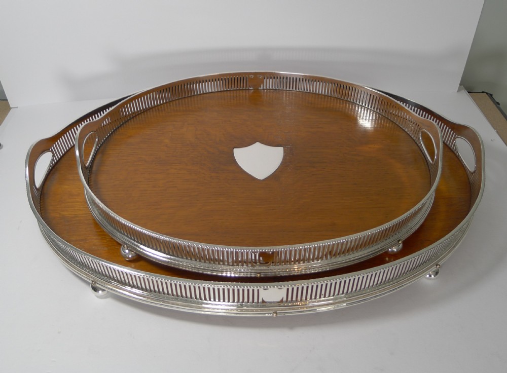 Grand Graduated Pair Late Victorian Oak and Silver Plate Serving Trays View XI