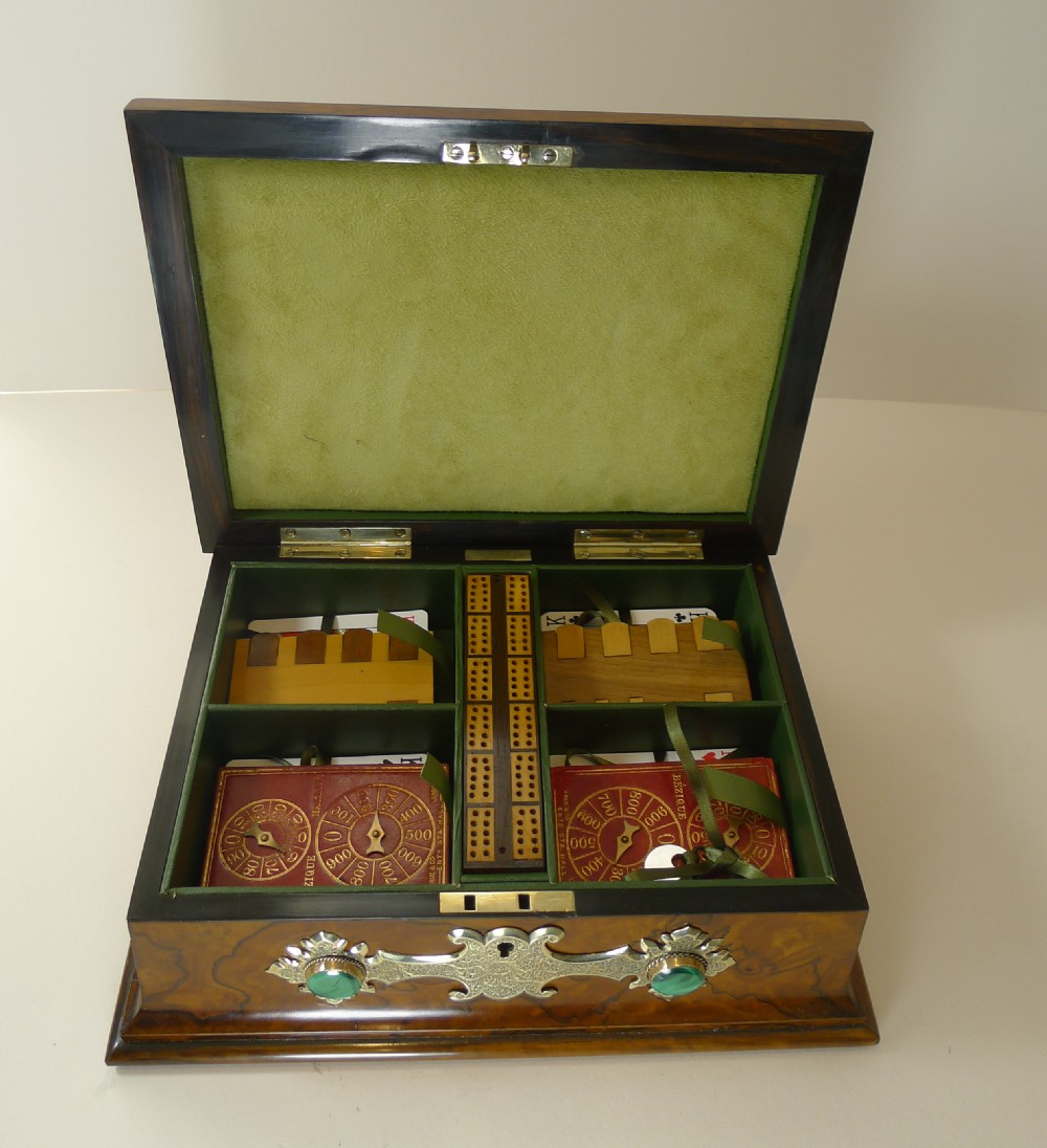 A rectangular burr walnut box decorated with engraved brass strapwork and inset green malachite cabochons. View IV
