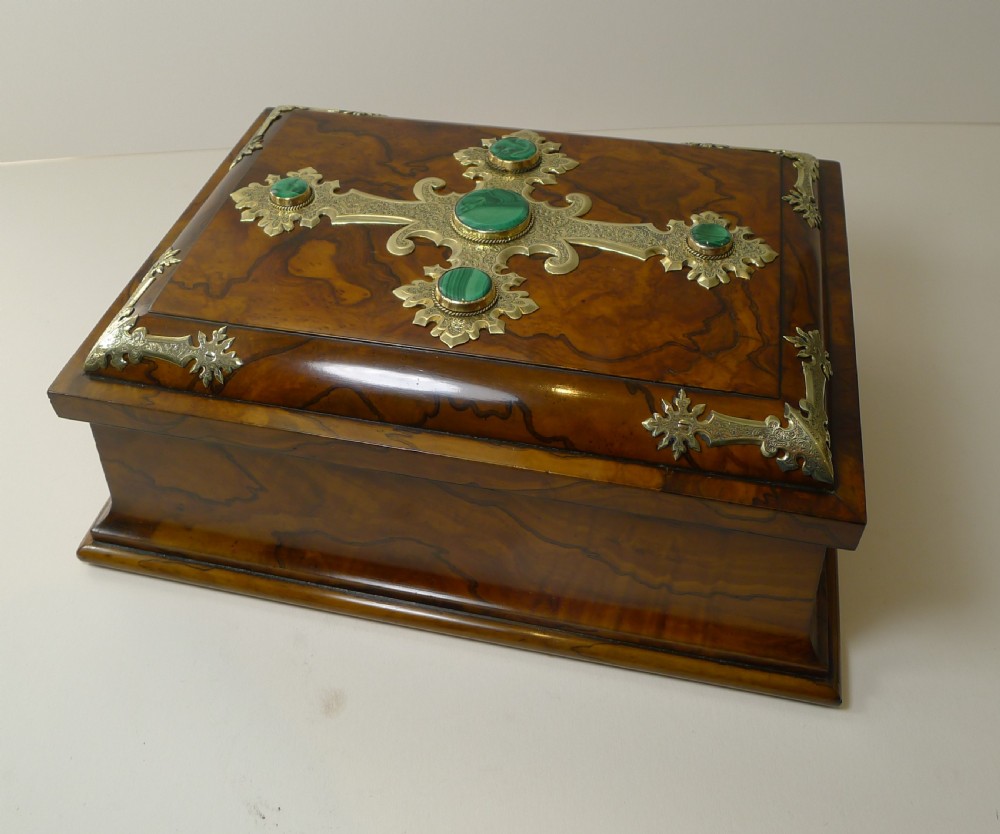 A rectangular burr walnut box decorated with engraved brass strapwork and inset green malachite cabochons. View XII