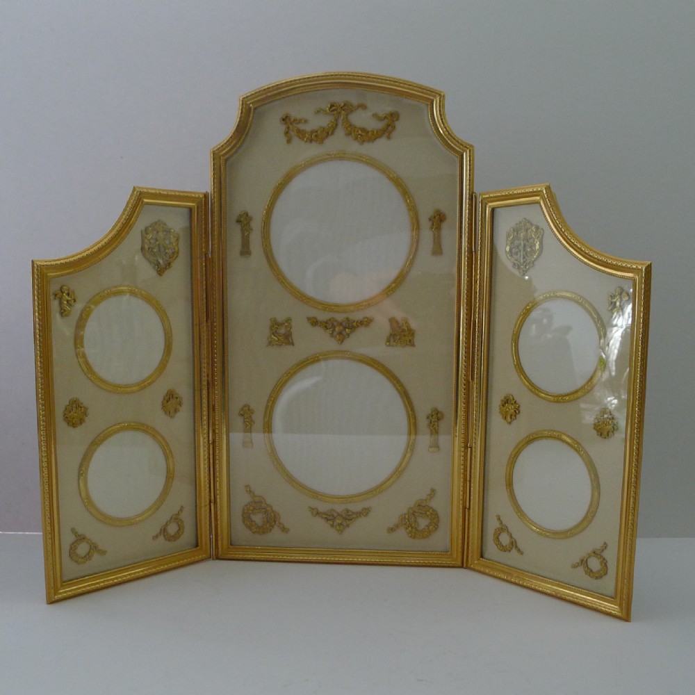 Magnificent French Gilded Bronze Six Aperture Picture Frame