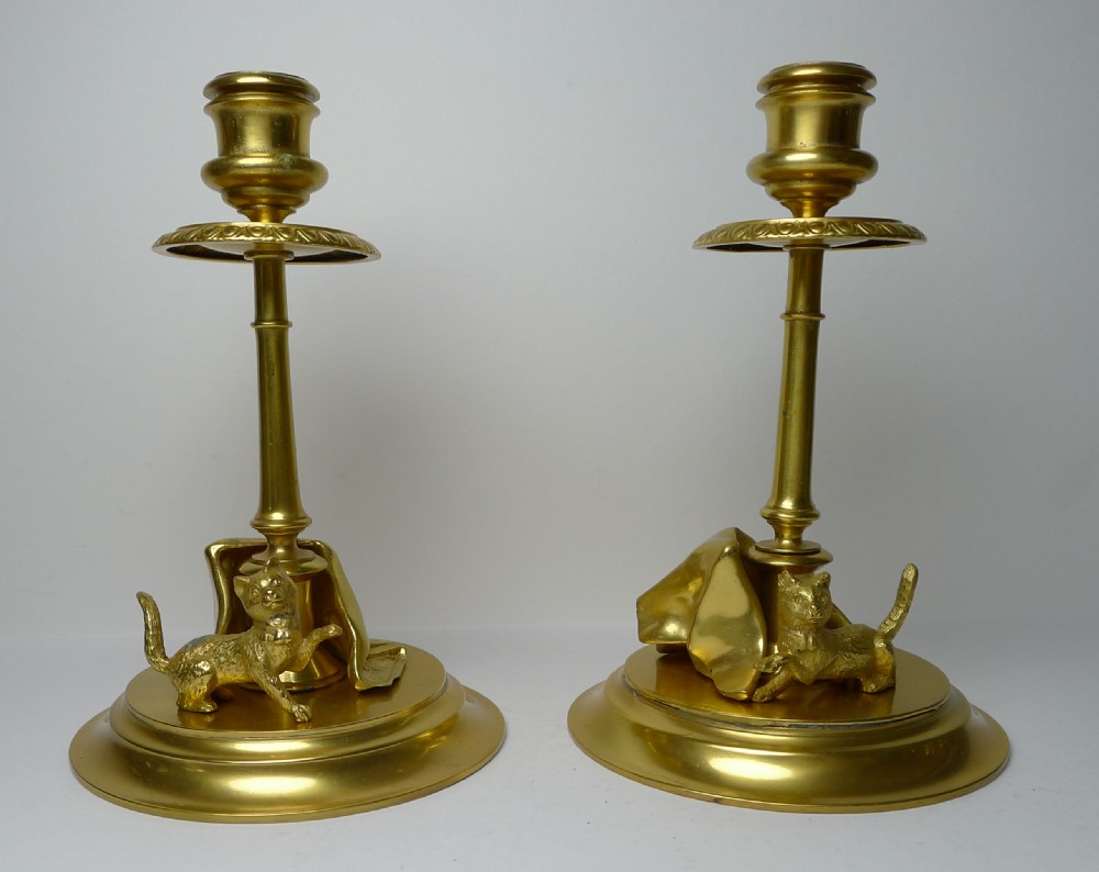 A six-piece gilded bronze desk set decorated with sculpted kitten figures, including two candlesticks, a pen tray, an inkwell, a seal, and a letter opener. View II