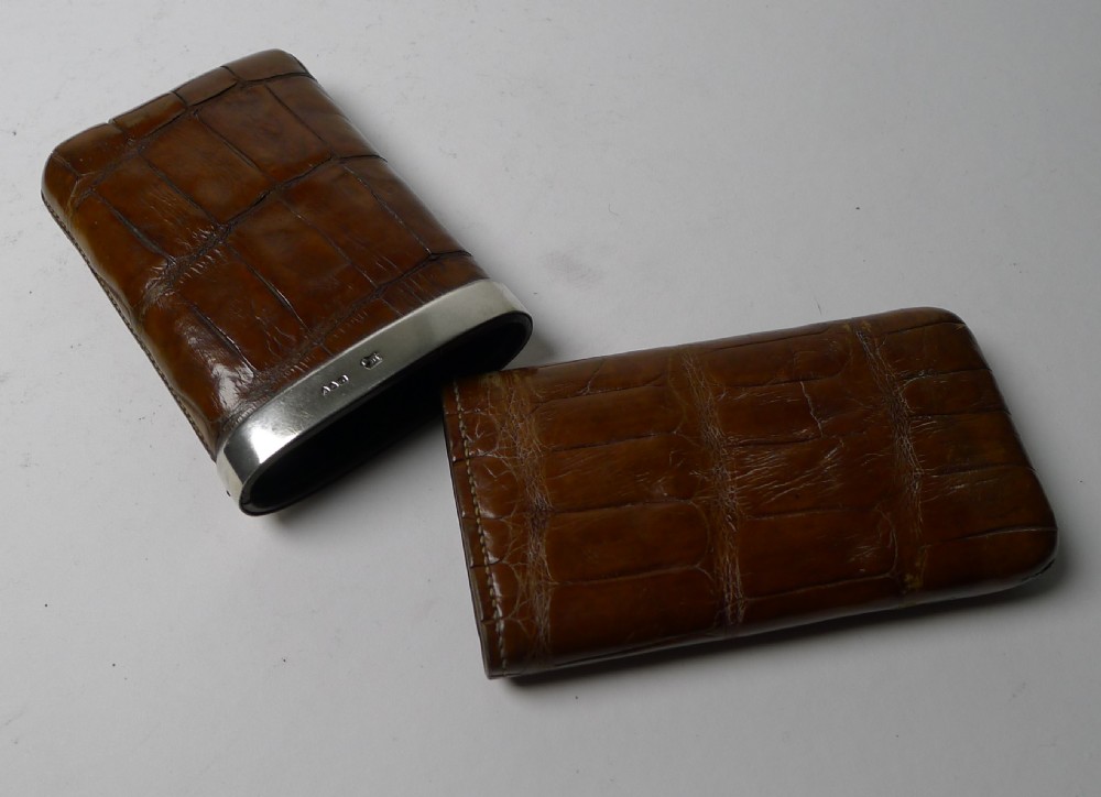 A small Victorian crocodile leather cheroot case in warm brown with a hallmarked silver collar. View V