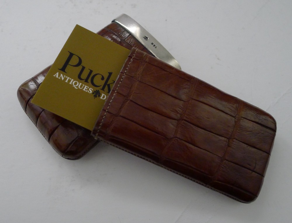 A small Victorian crocodile leather cheroot case in warm brown with a hallmarked silver collar. View XII