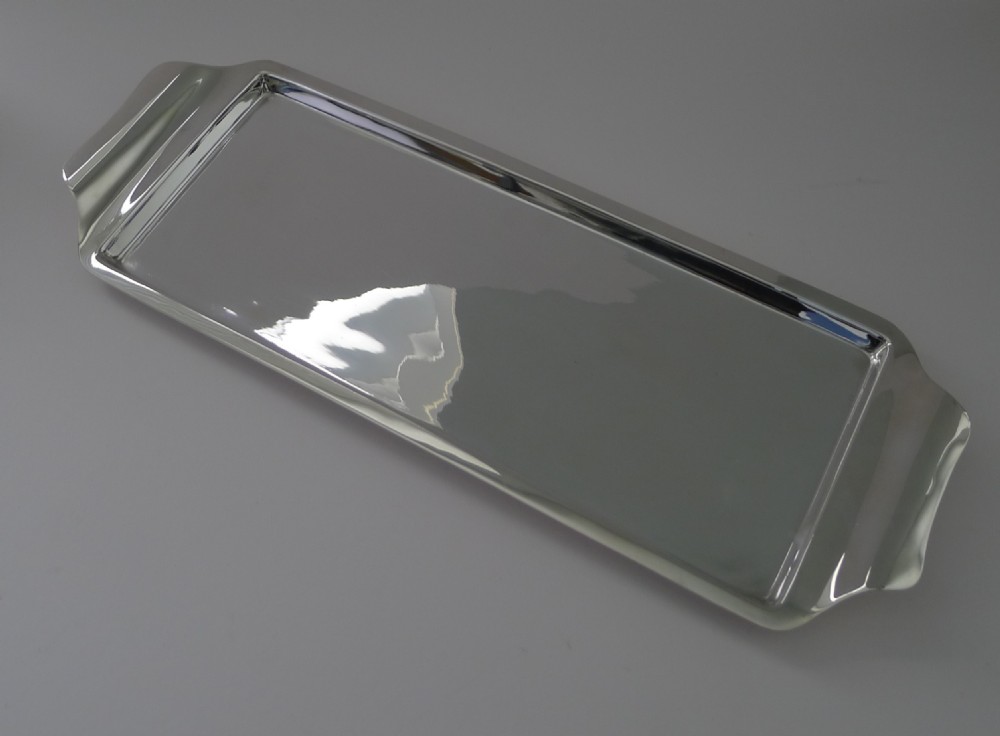 A rectangular Art Deco silver-plated drinks tray featuring integrated curved handles and a smooth polished surface. View II