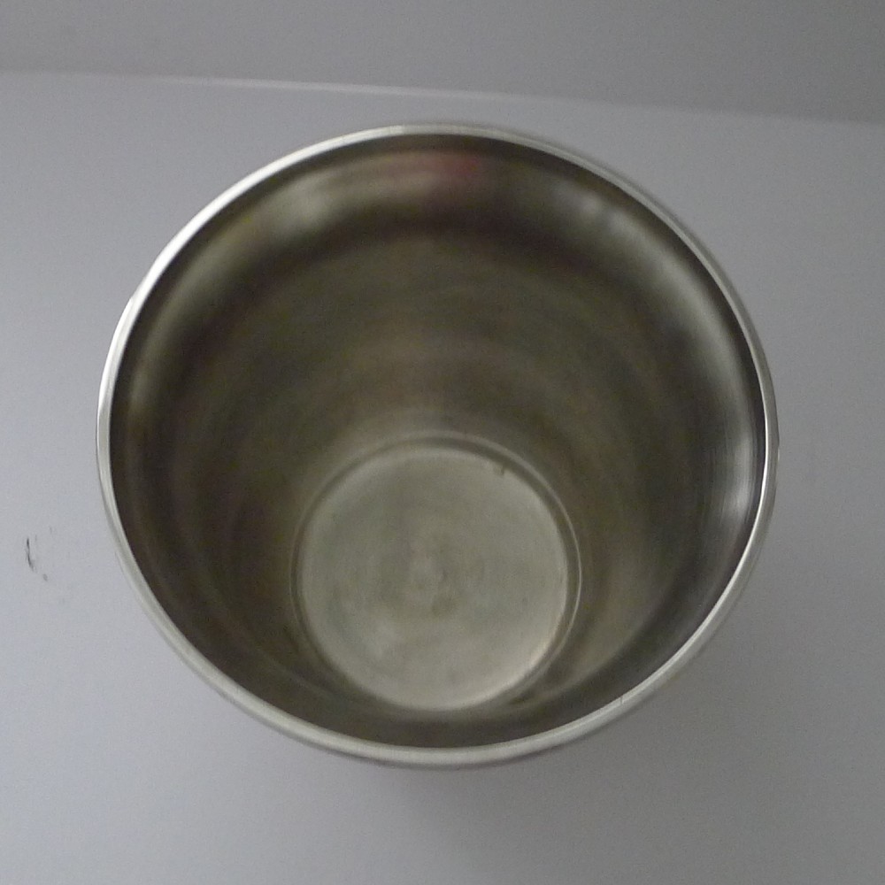 A polished silver-plated French champagne bucket with twin side handles and a detailed reeded rim. View XIII