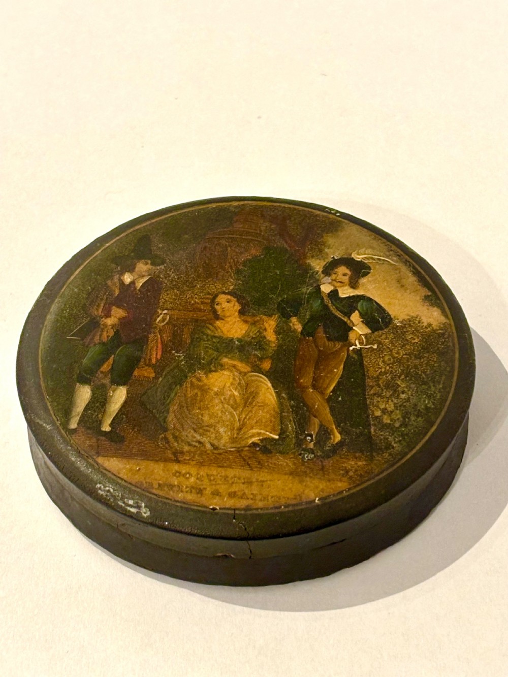 A 19th Century Circular Papier Mache Snuff Box Printed Coquette Gravity Gaiety