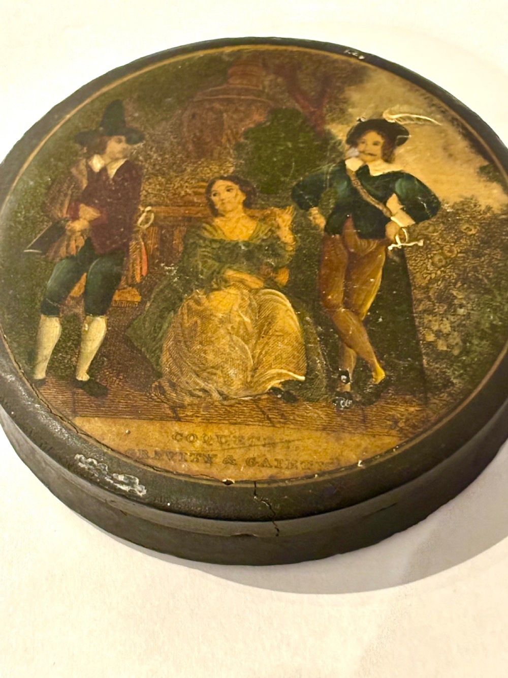 A 19th Century Circular Papier Mache Snuff Box Printed Coquette Gravity Gaiety View II