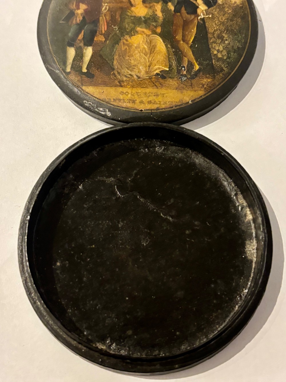 A 19th Century Circular Papier Mache Snuff Box Printed Coquette Gravity Gaiety View VIII