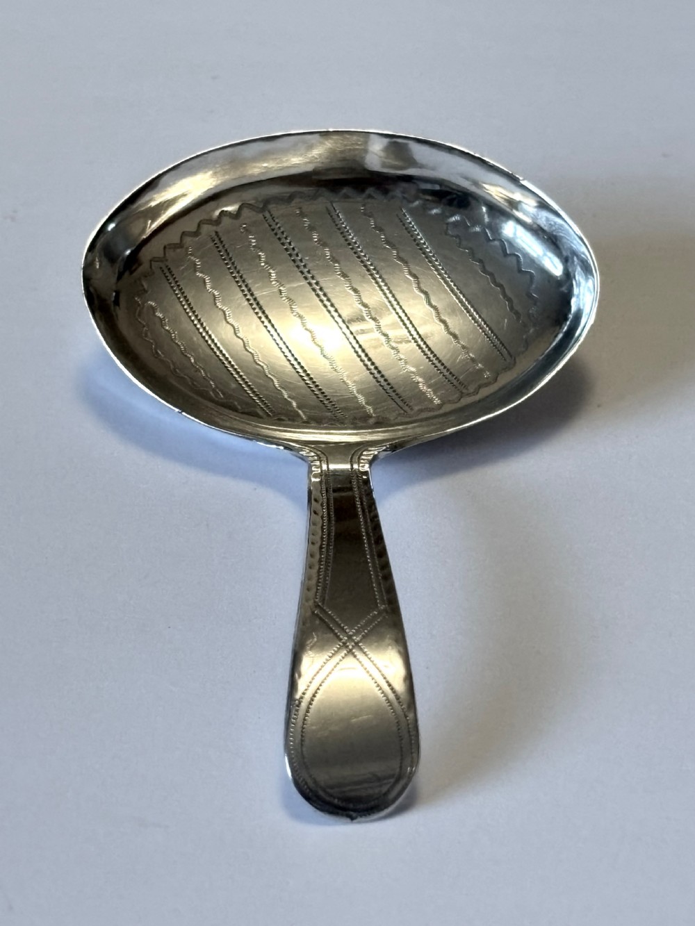 George III Silver Bright-cut Caddy Spoon Joseph Taylor Birmingham 1796