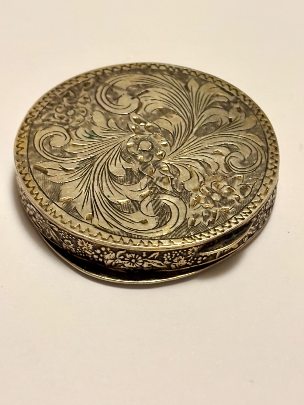 A circular vintage Italian 800 silver powder compact featuring a hand-painted enamel scene of harvest workers framed by a cobalt blue enamel border. View VII