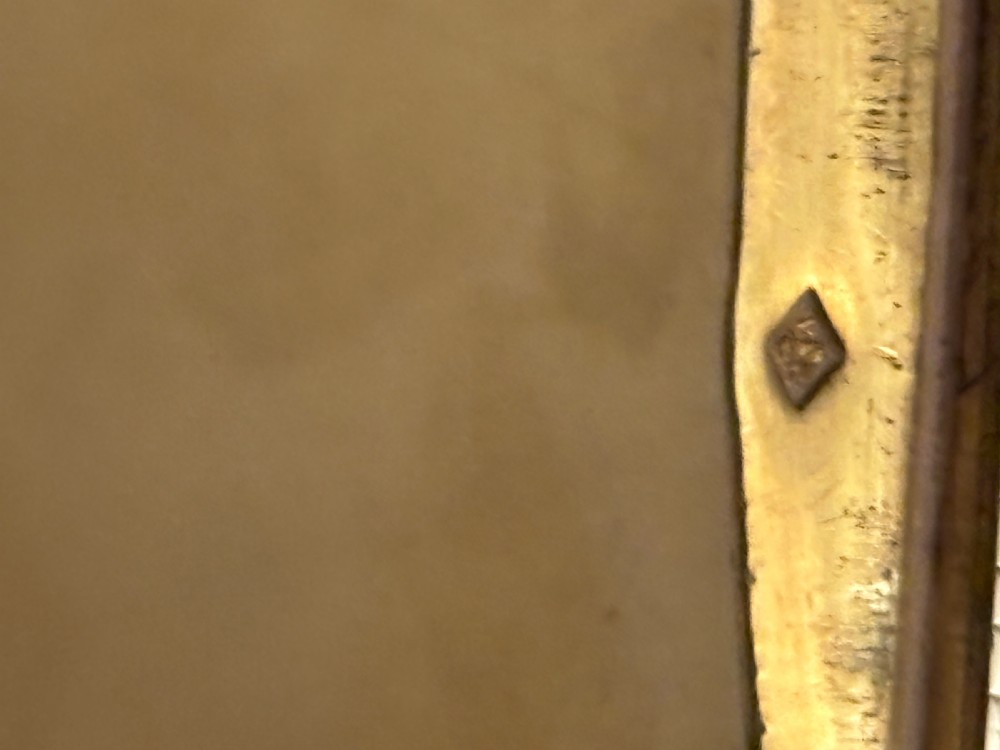 A small rectangular 19th-century French 950 silver gilt snuff box decorated with dense chased scrolling patterns and stippled texture. View VIII