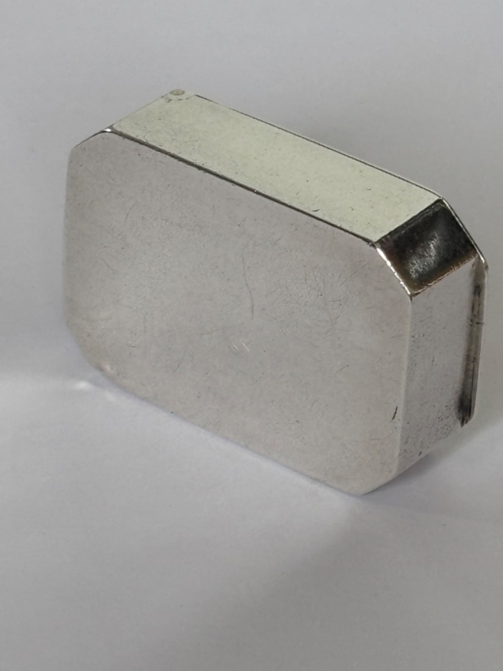 An 18th-century Georgian sterling silver pocket snuff box featuring canted corners and a flush integrated hinge. View V