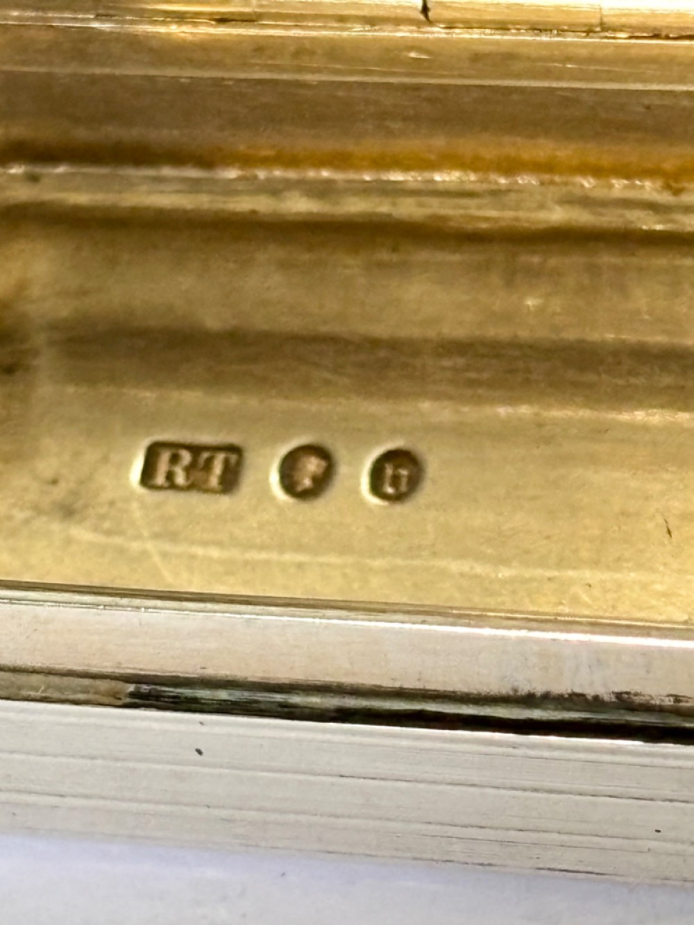A Victorian silver gilt rectangular snuff box featuring engine-turned reeded decoration and a central rectangular cartouche on the lid. View III