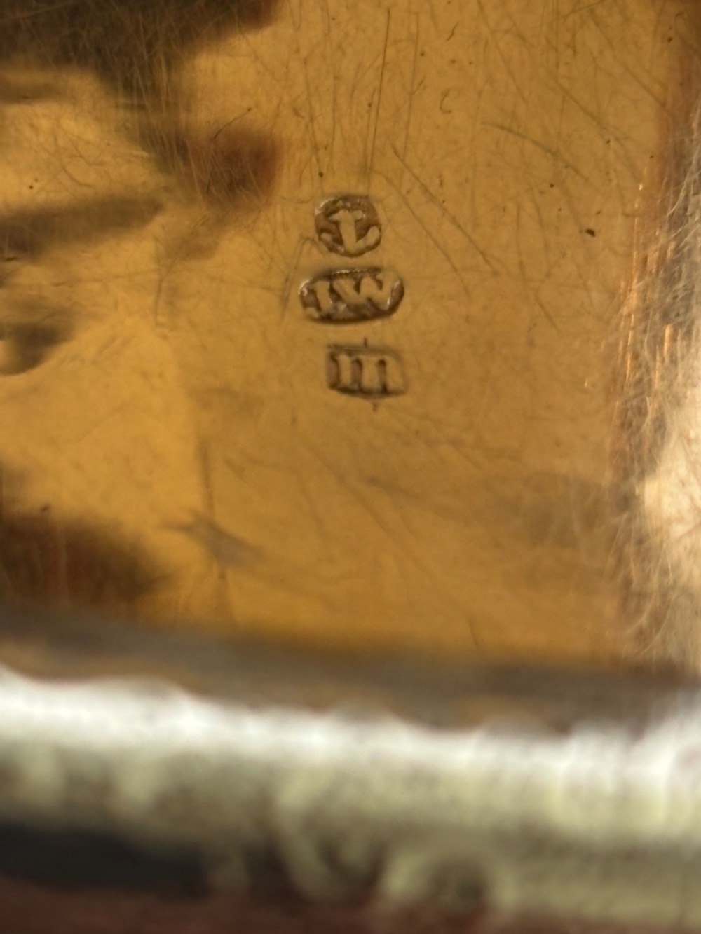 A curved antique sterling silver pocket snuff box featuring elaborate hand engraving and a flush hinge. View XIII