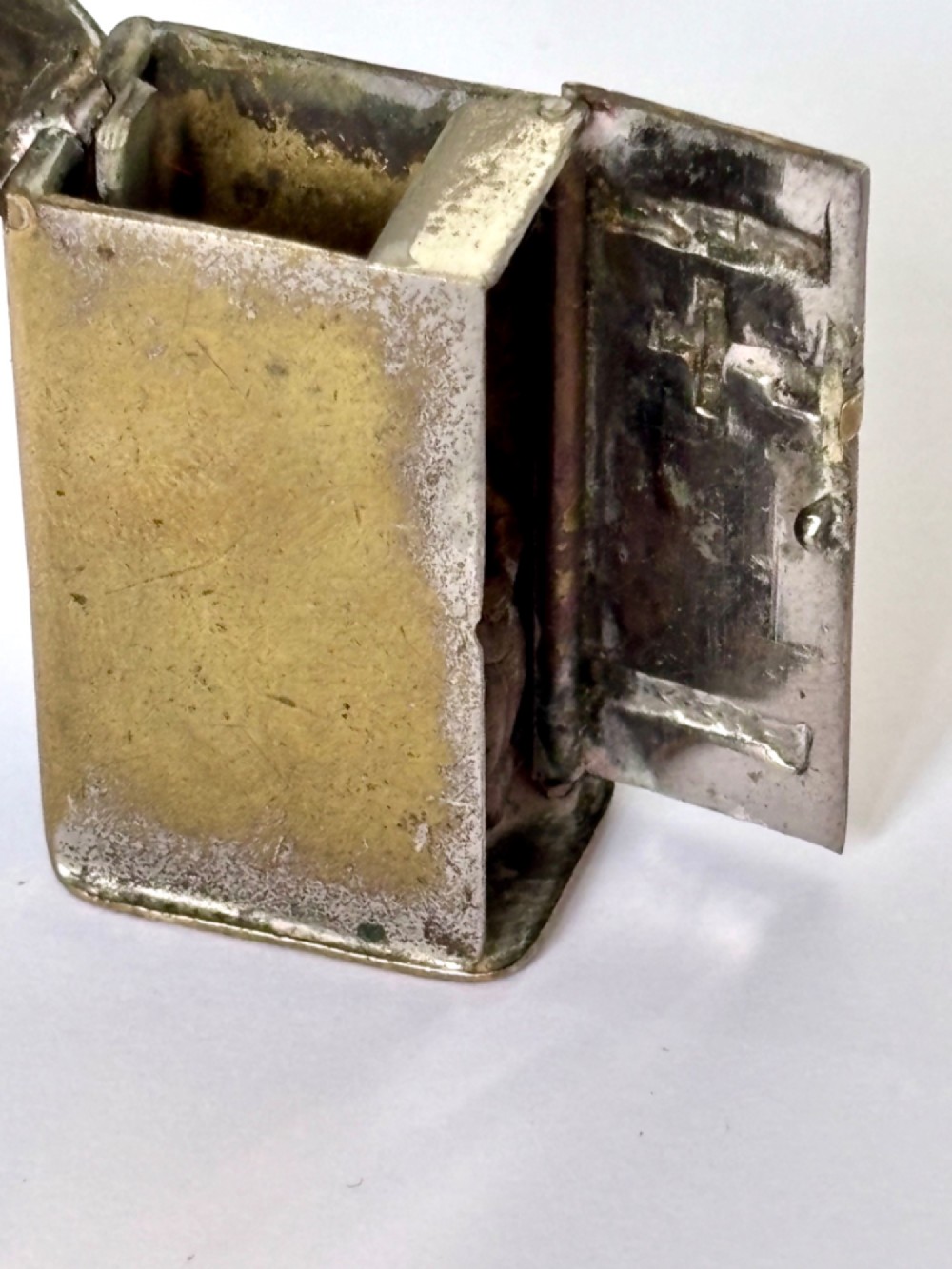 An antique Victorian brass novelty vesta case designed as an outhouse with an opening door revealing a gentleman seated inside. View VI