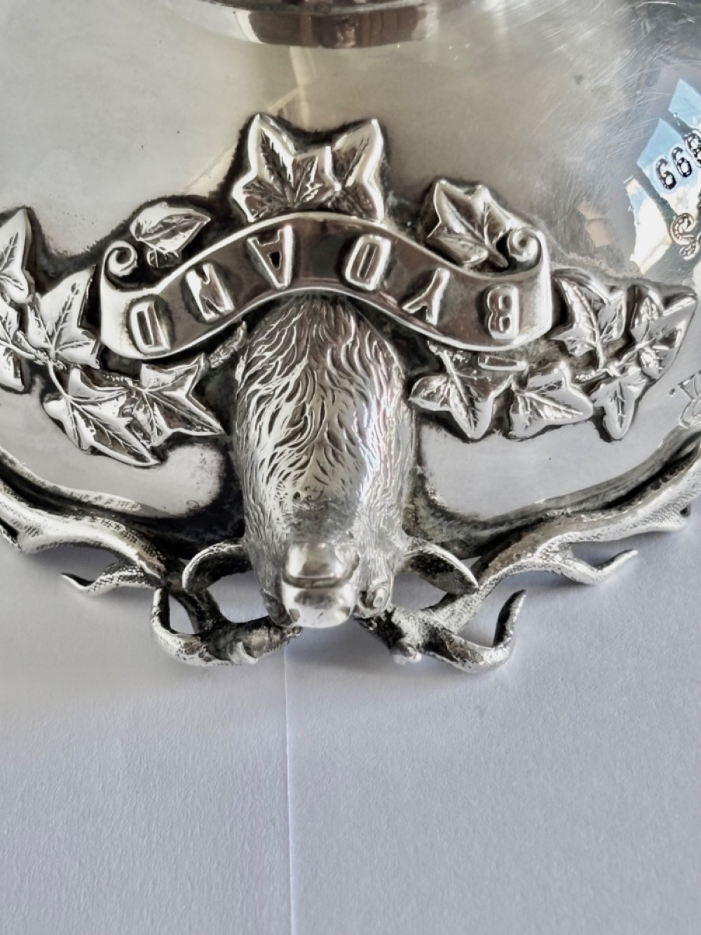 Late Victorian Scottish silver quaich featuring cast stag head handles and an engraved military presentation inscription on a circular pedestal base. View XIV