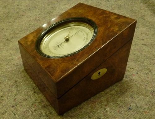 A Gentleman's Burr Walnut Desk-top Barometer