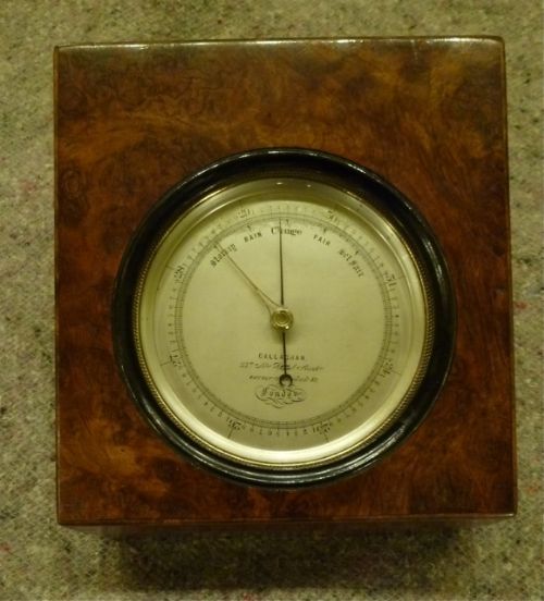 fig 1. A GENTLEMAN'S BURR WALNUT DESK-TOP BAROMETER