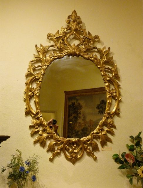 Large Carved and Gilded Oval Mirror