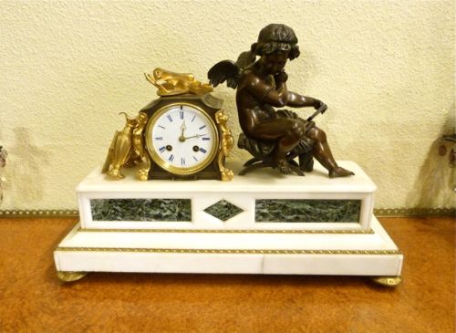 A Handsome French Bronze/marble Mantle Clock