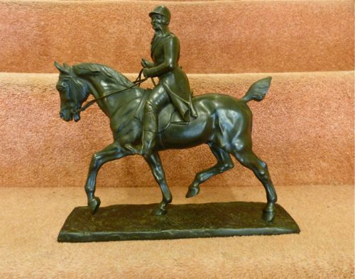 A Delightful Bronze Sculpture of a Huntsman