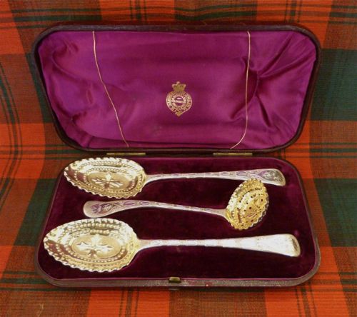Cased Set of Berry Spoons and Sugar Sifter Spoon