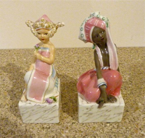 Pair of Royal Worcester Porcelain Figures