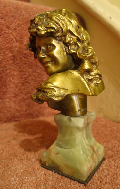 fig 1. GILT BRONZE SCULPTURE OF A HAPPY GIRL