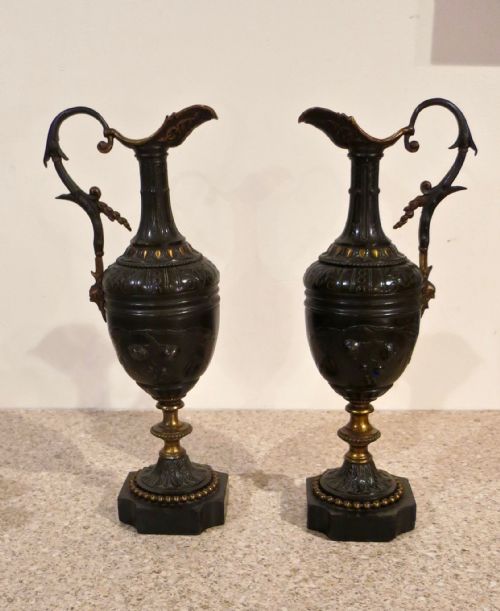 Elegant Pair of Bronze Ewers