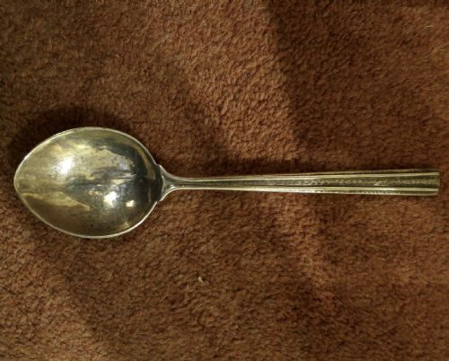 Omar Ramsden: A Fine Hammered Silver Spoon
